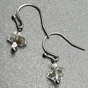 Herkimer Diamond Earrings made with three Herkimer Diamond beads using gunmetal wire, .75” long