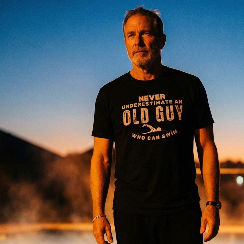 Old Guy Swimmer T-Shirt – Never Underestimate a Man Who Can Swim Tee, Swim Dad Gift, Coach Shirt, Masters Swimming Humor Top for Men. never underestimate a man who can swim senior athlete shirt
swim dad gift t-shirt for birthday or Father’s Day
men’s masters swimmer shirt with funny saying
pool lover tee for retired swimmers and coaches
swimmer graphic t-shirt for older men with style