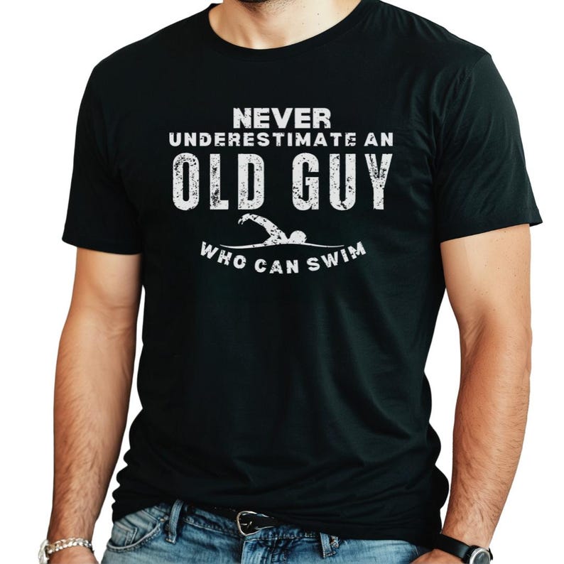 old guy swimmer shirt for coach or dad birthday gift
never underestimate an older swimmer funny tee
senior masters swim shirt for men who love the pool
swimmer humor t-shirt for father’s day or retirement
unisex swimming gift shirt for older competitive swimmers