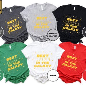 a collection of six t-shirts with different designs and colors, each featuring a unique phrase related to the wearer's relationship status.