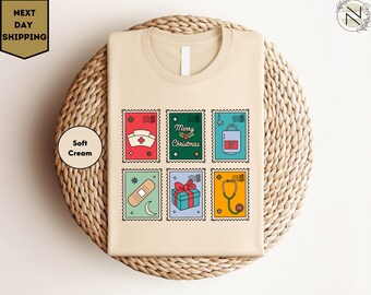 Camiseta navideña con lazo de estetoscopio, camiseta navideña de enfermera, camiseta navideña con lazo coqueto, regalo navideño de enfermera, camiseta navideña con lazo