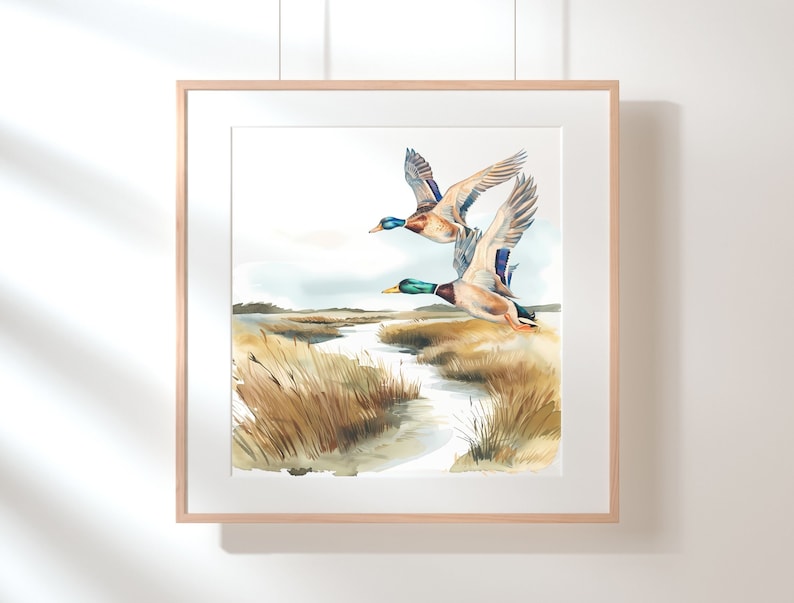 May include: A watercolor painting of two mallard ducks flying over a marsh. The ducks are brown and green with blue wings. The marsh is painted in shades of brown and green.