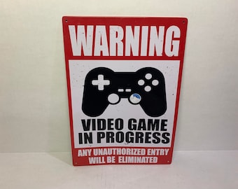 Metal Sign "Warning: Vide Game in Progress Any Unauthorized Entry will be Elimiated"