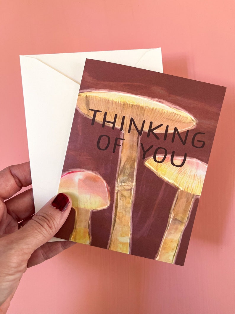 Thinking of You card with mushroom art on a burgundy background