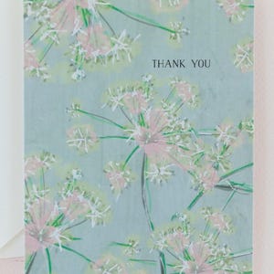 Carte de remerciement avec joli art botanique