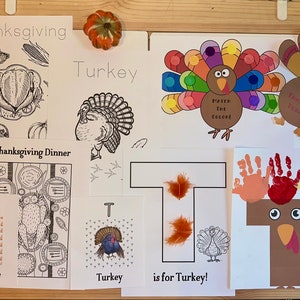 May include: A collection of Thanksgiving-themed crafts for children, including colouring pages, a turkey matching game, a handprint turkey, and a letter T is for Turkey activity.