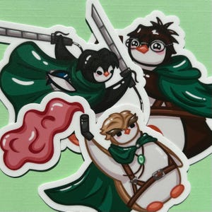 May include: A selection of cartoon stickers depicting penguins and an owl in green capes, holding swords. The stickers have white borders and are on a light green background. One sticker features a pink cloud.