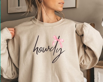 Coquette howdy sweatshirt, Pink bow shirt, Western Coquette shirt, Cowgirl sweater, Gift for cowgirl, Texas girl tee, Coquette bow Shirt