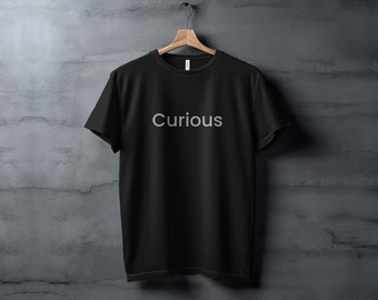 Curious Typography T-Shirt, Minimalist Black Tee, Unisex Statement Shirt, Trendy Fashion Top, Casual Word Apparel