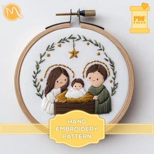 May include: Hand embroidery pattern featuring a nativity scene with Mary, Joseph, and baby Jesus. The design is framed in a wooden hoop and includes a star and greenery.