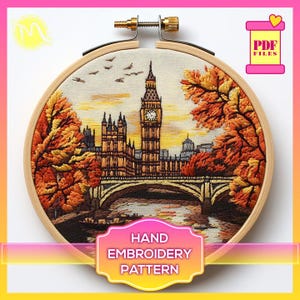 May include: Hand embroidery pattern featuring a detailed depiction of the Houses of Parliament and Big Ben in London, England. The scene is set in autumn with colourful trees and a bridge over a river.