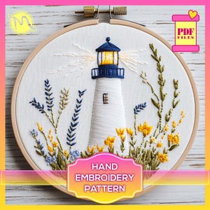 May include: A hand embroidery pattern featuring a white lighthouse with a blue roof and yellow windows, surrounded by yellow, blue, and green flowers. The pattern is in a wooden embroidery hoop. The text "HAND EMBROIDERY PATTERN" is below the hoop.