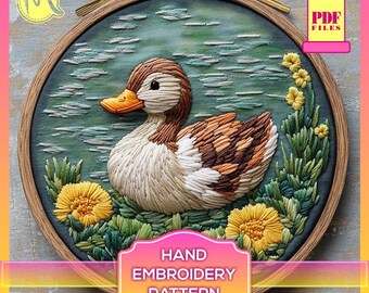 May include: Hand embroidery pattern featuring a duck swimming in a pond with yellow flowers. The pattern is in a wooden embroidery hoop. The text "HAND EMBROIDERY PATTERN" is below the hoop.