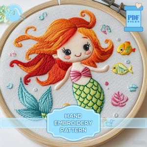 May include: A hand embroidery pattern featuring a cute mermaid with long red hair, a green tail, and pink top. The pattern also includes a variety of sea creatures and plants, such as fish, seaweed, and shells. The pattern is available as a PDF file.
