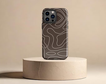 May include: A brown phone case with a white abstract pattern. The case has a black camera bump with three lenses.