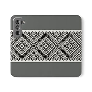 May include: A gray phone case with a white and black geometric pattern. The case has a triple camera lens on the back.