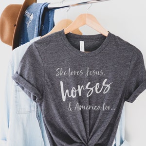Western Patriotic Horse Shirt for Cowgirl, Barrel Racer, or Horse Trainer, Cute Horse Show Gear, She Loves Jesus, Horses & America