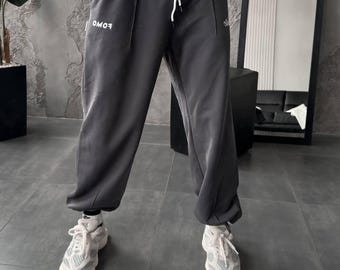 Pantalones deportivos bordados para hombre / Pantalones deportivos de polar con puños / Pantalones de calle con logotipo