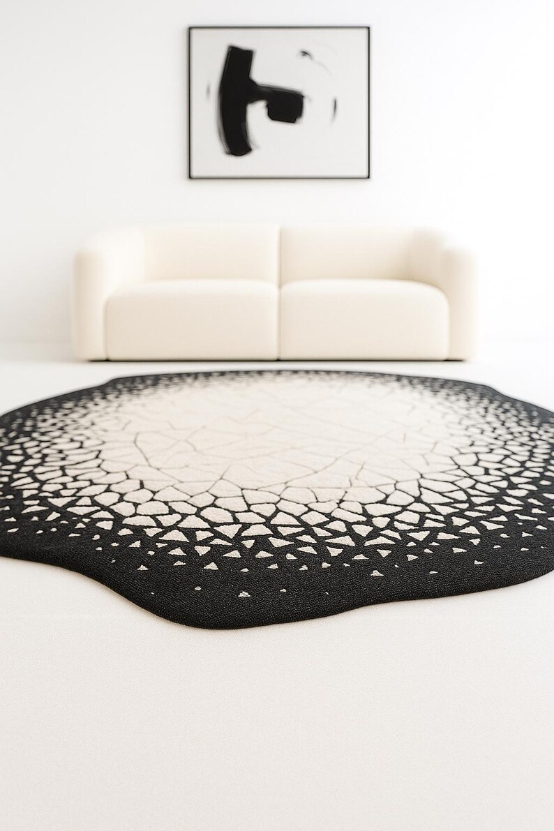 Wide interior view featuring minimalist décor styled with modern abstract eclipse rug.