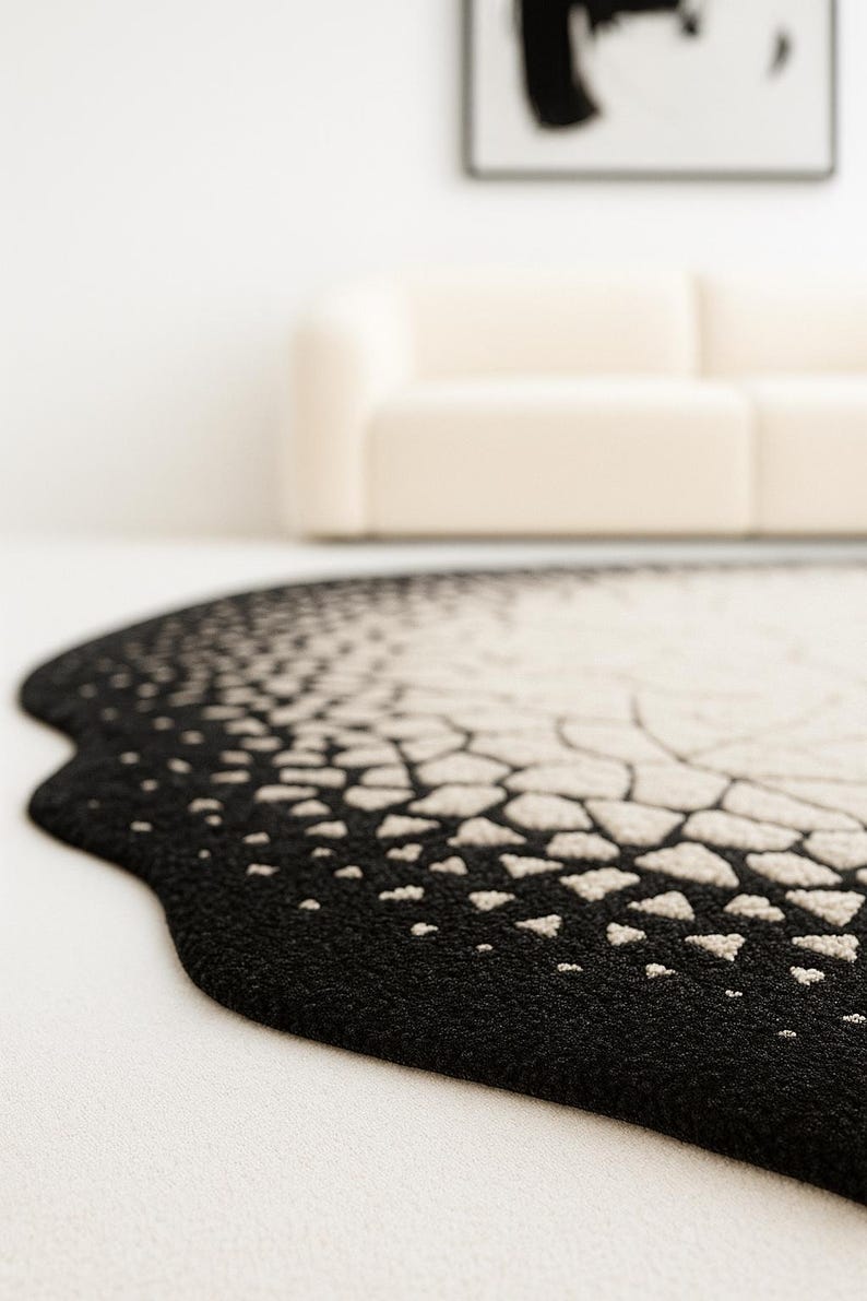 Detail macro shot showing smooth silk sheen and wool fibers of the eclipse design.