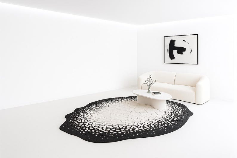 Side angle showing low pile height and clean edges of the cracked eclipse abstract rug.