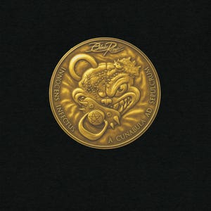 May include: A gold-colored coin with a detailed relief of a bear-like creature with a pacifier and spiked collar. The coin has the text "Blake Rose", "Innocens Infectus", and "A Cunabula Ad Sepulcrum".
