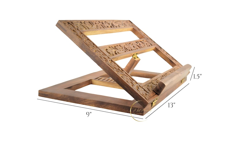 May include: A wooden book stand with intricate carvings. It measures 9 inches wide, 13 inches long, and 1.5 inches high.