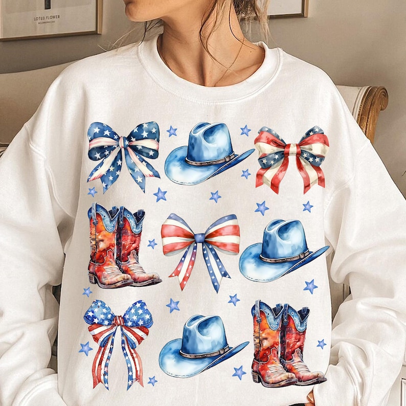 May include: White sweatshirt with a red, white, and blue patriotic theme. The design features cowboy hats, boots, and bows with stars.
