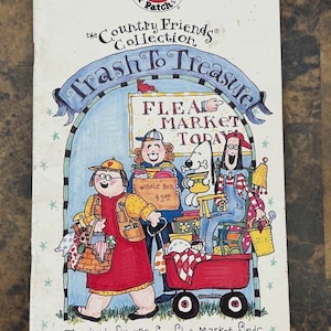 May include: A vintage book cover titled "Trash to Treasure" from the "Country Friends Collection." The illustration depicts cartoon characters at a flea market, with a sign that reads "Flea Market Today." The cover is in a series, book #18.