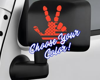 May include: A black car side mirror with a red handprint decal featuring an American flag design. The text "Choose your color!" is written in blue below the handprint.