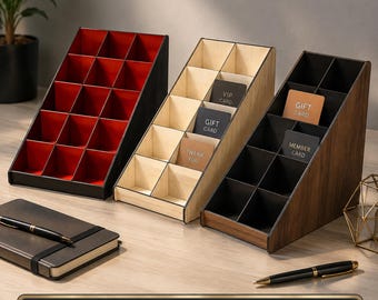 May include: Three slanted wooden organisers with multiple compartments. One has a red interior, one is light wood, and one is dark wood. The light wood organiser holds cards labelled VIP CARD, GIFT CARD, and THANK YOU. The dark wood one holds GIFT CARD and MEMBER CARD.