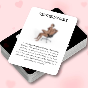May include: A black and white card with the text "SQUATTING LAP DANCE" in bold, white letters. The card describes a dance move with a person sitting on a chair with their legs spread.