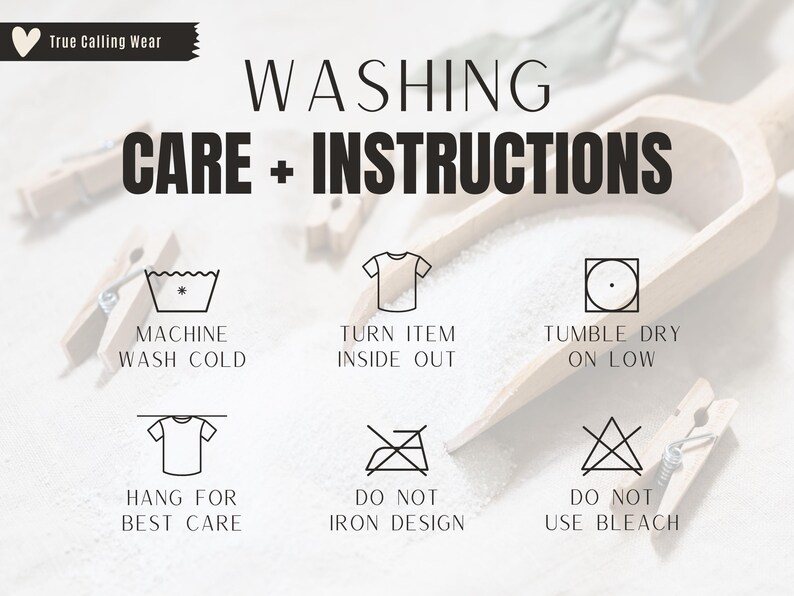 May include: Image with washing instructions. Text includes "WASHING CARE + INSTRUCTIONS" and icons for machine wash cold, turn item inside out, tumble dry on low, hang for best care, do not iron design, and do not use bleach. Wooden clothespins are in the background.