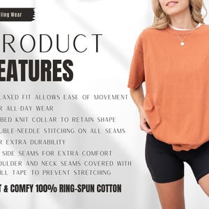 May include: An orange short-sleeved t-shirt with a white collar is shown. The text on the left reads "PRODUCT FEATURES" and lists features like relaxed fit, ribbed collar, and double-needle stitching. The shirt is made of soft, ring-spun cotton.