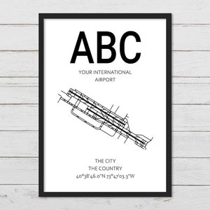 May include: A black and white airport map print with the text "ABC YOUR INTERNATIONAL AIRPORT" and the coordinates "40&deg;38'46.0"N 73&deg;47'03.3"W".
