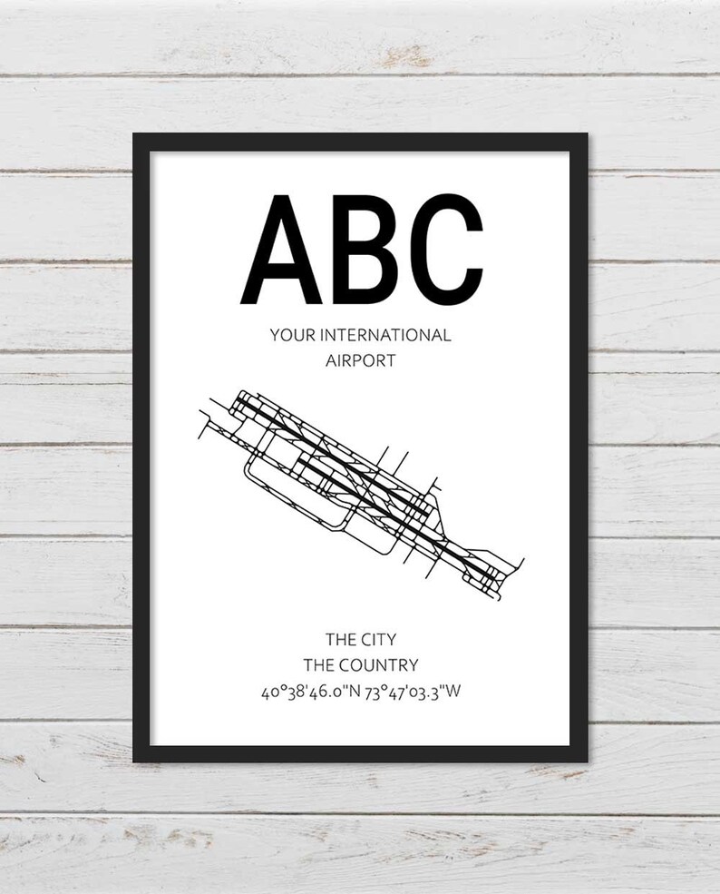 May include: A black and white airport map print with the text "ABC YOUR INTERNATIONAL AIRPORT" and the coordinates "40&deg;38'46.0"N 73&deg;47'03.3"W".