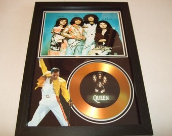 queen   signed  mount framed
