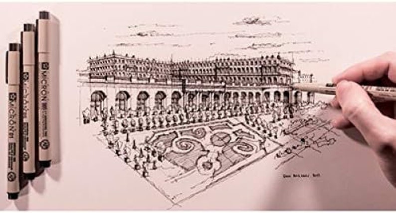 May include: A black and white ink drawing of a building with a courtyard. The drawing is done with a Micron pen. The drawing is on a white sheet of paper.