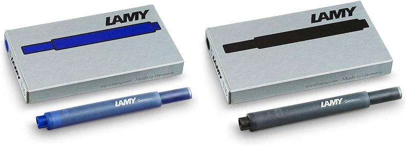 May include: Two packs of blue and black ink cartridges for fountain pens. The packs are silver with the LAMY logo and the words "Made in Germany". The cartridges are blue and black.