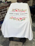 Professional white hairdressing cape snap closure- Christmas gifts for Salon, Barbers, Hairdresser gifts product logo