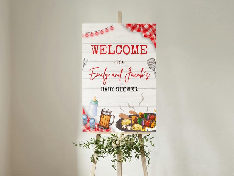 K&ouml;nnte beinhalten: Willkommen zur Babyparty von Emily und Jacob Schild mit wei&szlig;em Holz Hintergrund, rot-wei&szlig;em Karomuster und einer Cartoon-Illustration eines Grills mit Essen, einem Bierkrug und einer Babyflasche.