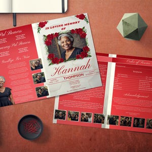 May include: A red and white funeral programme featuring a photograph of a woman surrounded by red roses. The programme includes the text "In Loving Memory of Hannah Thompson".