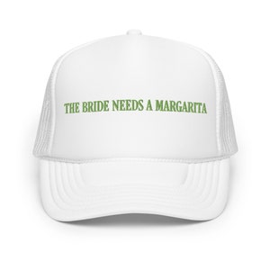 May include: White trucker hat with a green embroidered text that reads "THE BRIDE NEEDS A MARGARITA"