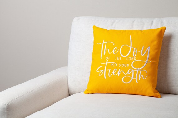 Yellow embroidered throw pillows deals