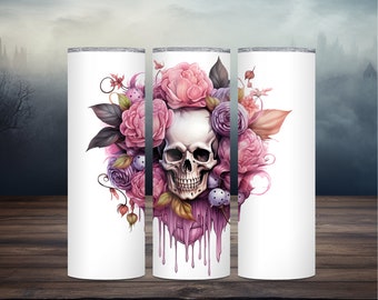 May include: A white stainless steel tumbler with a design of a skull surrounded by pink and purple flowers with dripping pink paint.