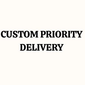 May include: The words "CUSTOM PRIORITY DELIVERY" are displayed in bold, black text against a cream-colored background. The text is centered and takes up most of the image.