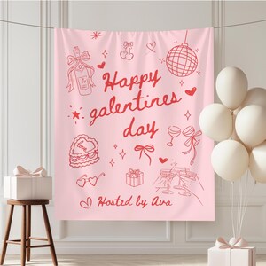 Op de afbeelding: Een roze achtergrond met rode illustraties en tekst voor een Galentine's Day-viering. Het ontwerp bevat een champagnefles, cake, glazen en de zin "Happy Galentines Day". Witte ballonnen en een geschenkdoos zijn ook aanwezig.