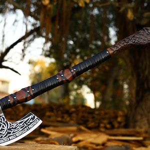 Wolf engraved axe