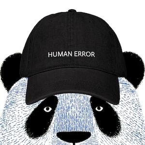 May include: Black baseball cap with the white text "HUMAN ERROR". The cap is worn by a panda with black and white fur and blue details.