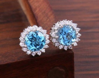 Pendientes de topacio azul cielo: Pendientes de plata de ley 925 con circonita cúbica.